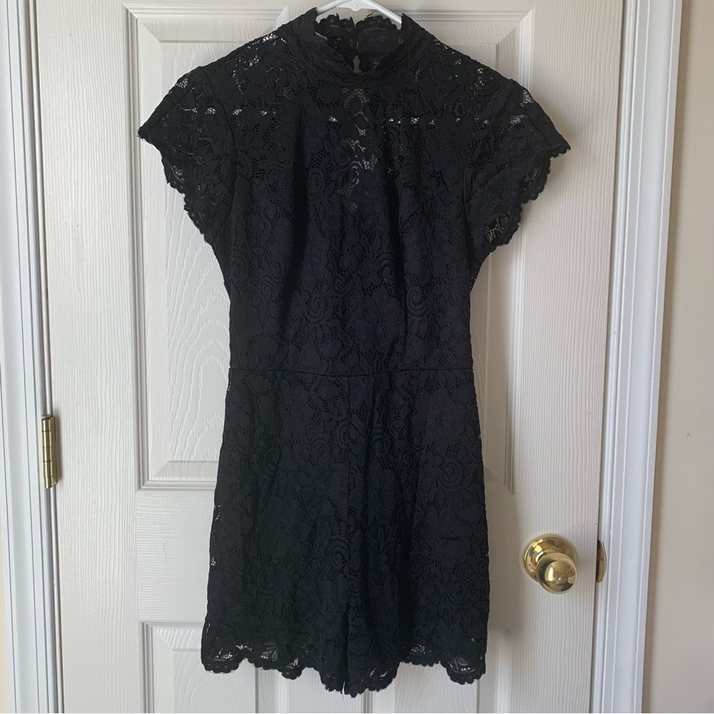 NWOT bebe high neck lace romper